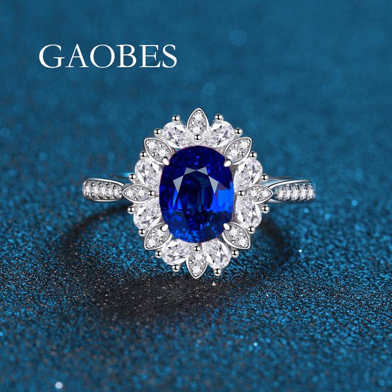 Women's 3.5 Carat Egg-shaped Ring: S925 Sterling Silver with Simulated Pigeon Blood Red, Green, and Nano Blue Stones and Full Diamond Accents.