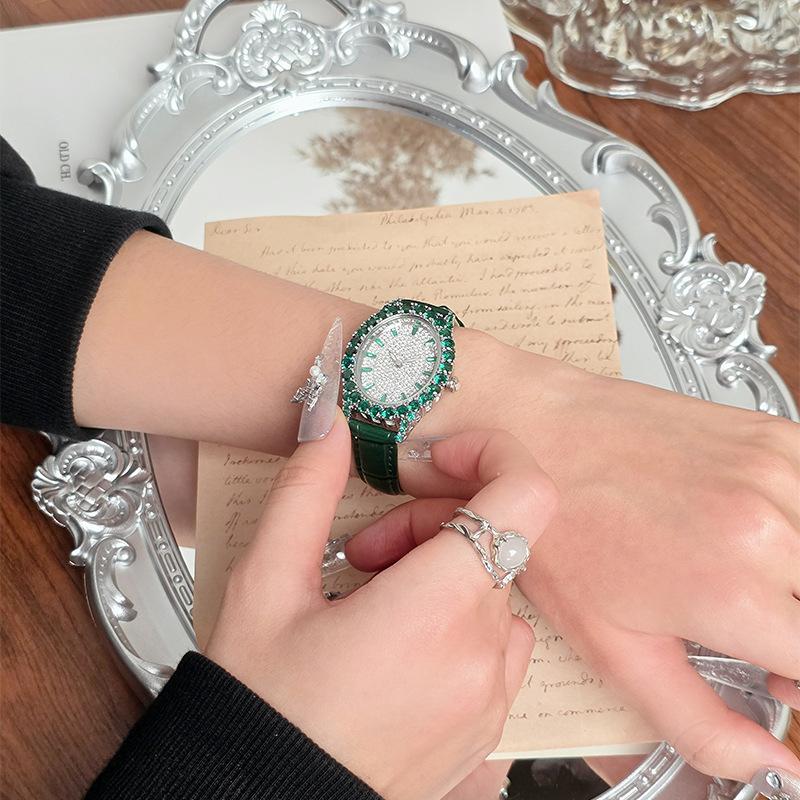 Full Diamond Emerald Watch Women's Full Diamond Goose Egg Light Luxury Niche Design Oval Dial Temperament Versatile Watch