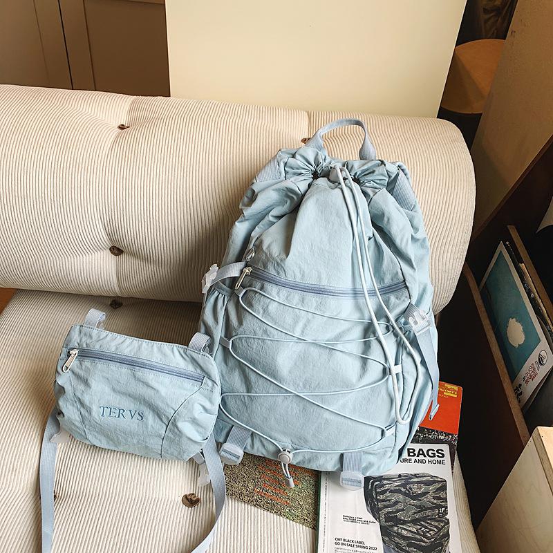 The new outdoor drawstring backpack is removable, the two-in-one backpack has a large capacity, and the commuter schoolbag is water-proof.