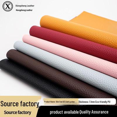 Eco-Friendly PU Lychee Pattern Leather, 1.1mm Thick, Brushed Backing, Skin-Feel Finish, Suitable for Shoes and Sofas.