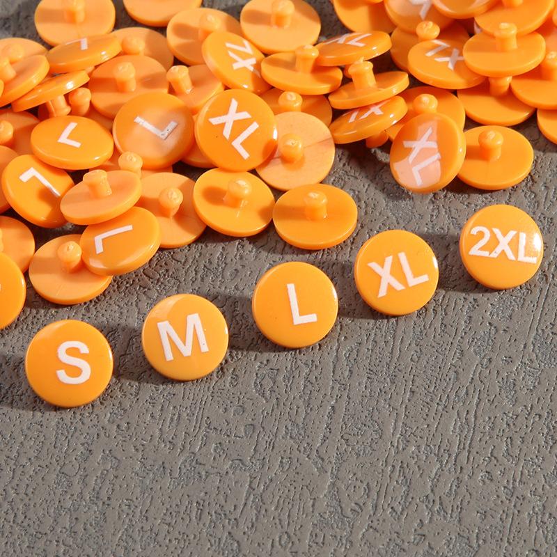 

Метка размера, круглая пряжка размера, размер зерна, пряжка меньшего размера, пластиковая одежда меньшего размера зерна, кнопка размера одежды. 15#