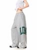 Damen Amerikanische Retro Sportliche Sweatpants mit Seitenbuchstaben-Print - Bodenlang, Lockere Passform, Elastischer Bund, Raw-Edge-Design