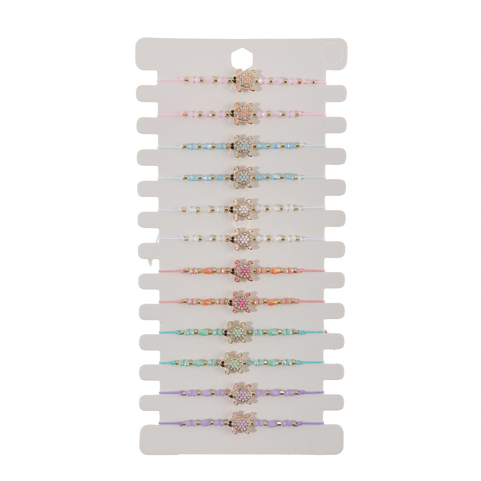 

Набор из 12 регулируемых плетеных браслетов ручной работы на черепашью тематику с кристаллами бирюзы из сплава и деревянными бусинами для женщин и мужчин F