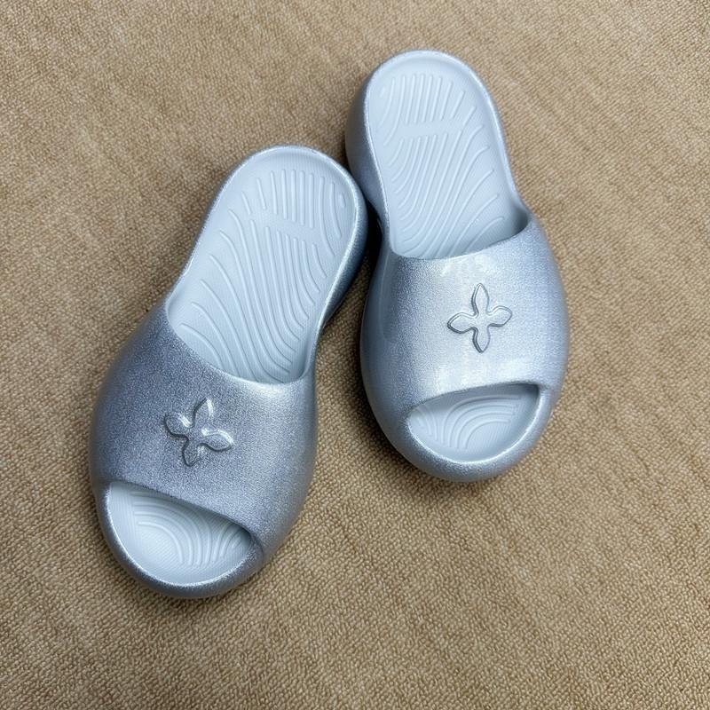 

Cross flower thick-soled EVA foam slippers women wear height-increasing one-word cool slippers 35-36 срібний