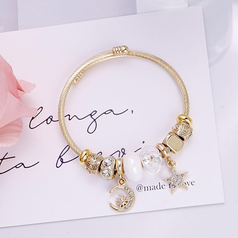 

Four Leaf Clover Beaded Bracelet with Moon and Star Pendant Stainless Steel Jewelry for Women