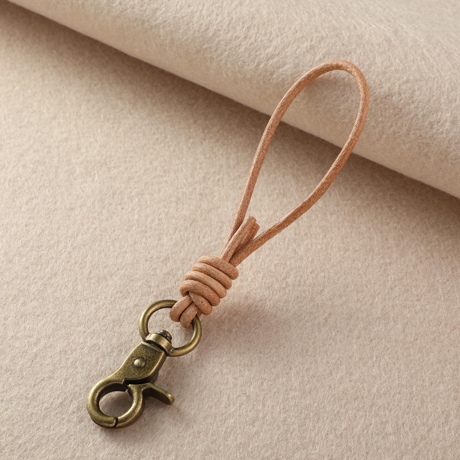Hand-Woven Retro Leather Keychain with Horseshoe Buckle