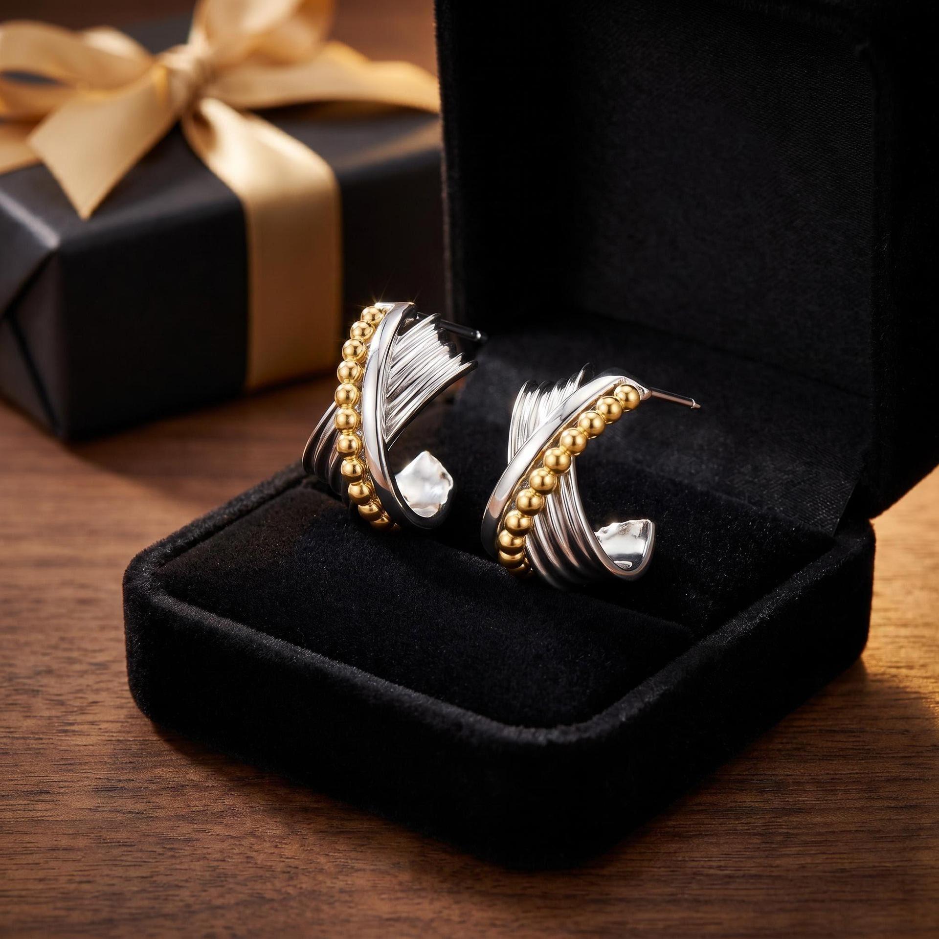 Yanbai Exquisite Two-Tone Intertwined Earrings for Women - Fashionable Gold & Silver, Versatile and Elegant Ear Ornaments.