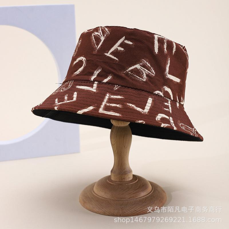 Doodle letter double-sided bucket hat, European and American fashionable casual sunshade hat, men's and women's spring/summer outing pot hat