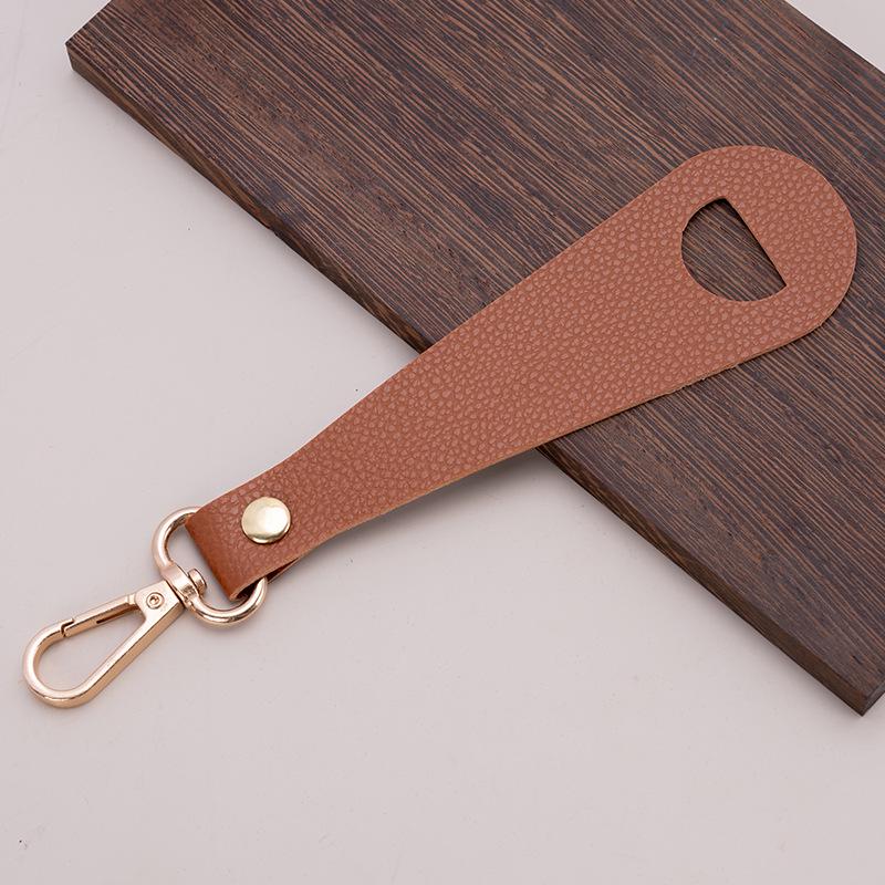 PU Leather Hat Clip: Portable, Hands-Free Holder for Sun and Baseball Caps - Anti-Loss Buckle Design.