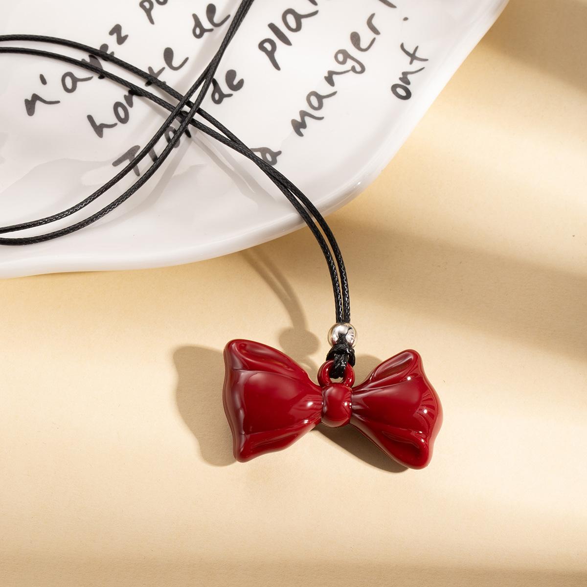 

Autumn And Winter Wine Red Ribbon Love Bow Pendant Necklace, Light Luxury Ankola Red Long Sweater Chain