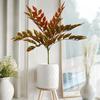 High-End Faux Potted Plant with Green Painted Wooden Leaves for Home and Courtyard Décor.