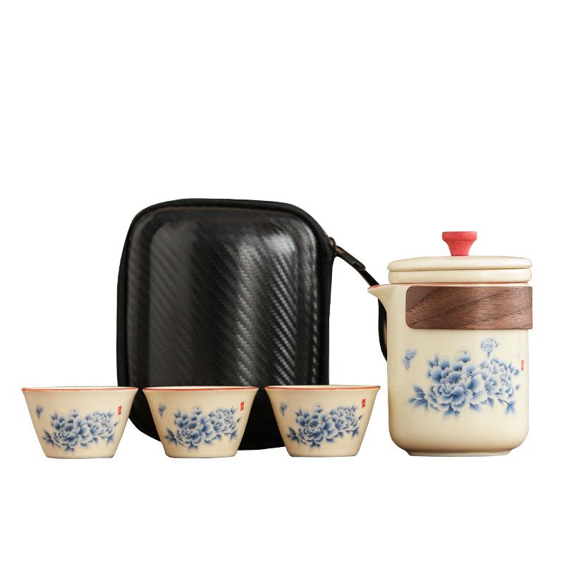 Retro household ceramics new Chinese kung fu tea set Dehua Huang Ru kiln Tianxiang peony high-end gift box