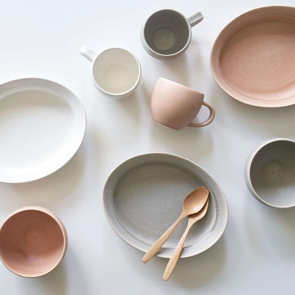 A Pair of Bowls, Each 12.5cm Diameter X 7.6cm High, Measuring 540ml, with a Soft, Crystalline Glass-like Texture. The Pair, Gray and Pink, Make a Perf