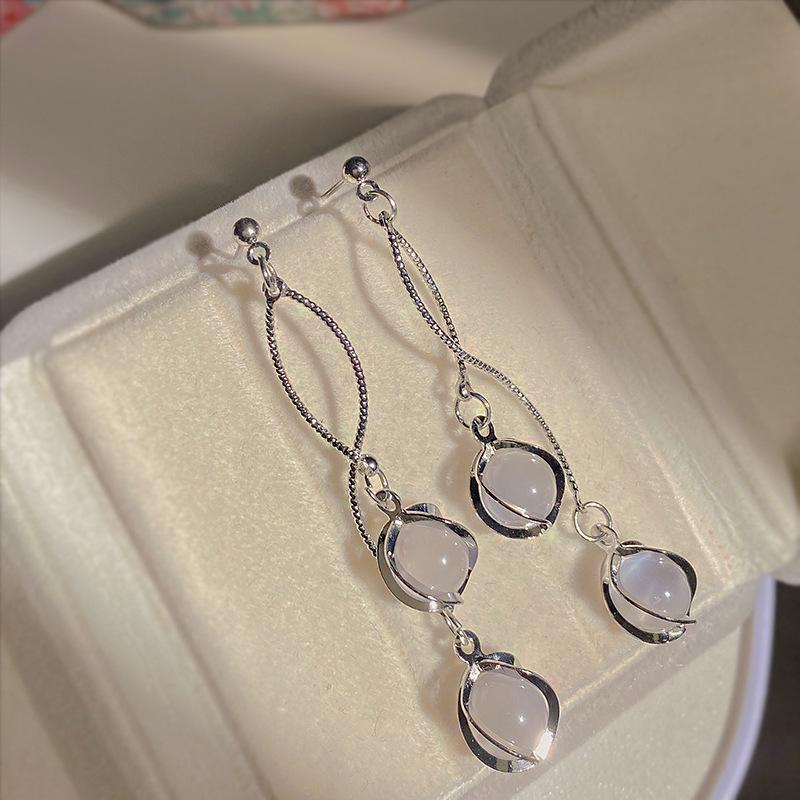 

Корейські срібні сережки 925 проби з розкішними діамантовими китицями - Елегантний та простий дизайн Silver Needle Version