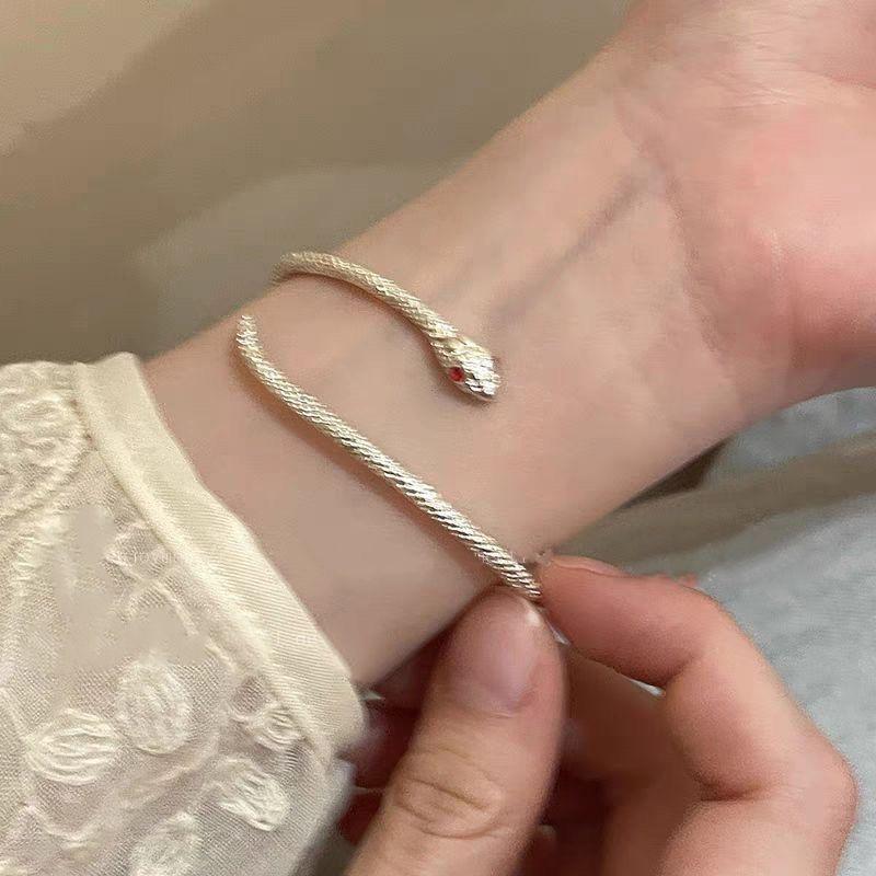 Silver Serpent Bangle: Minimalist Adjustable Design with Red-Eyed Detail - High-Quality Textured Bracelet