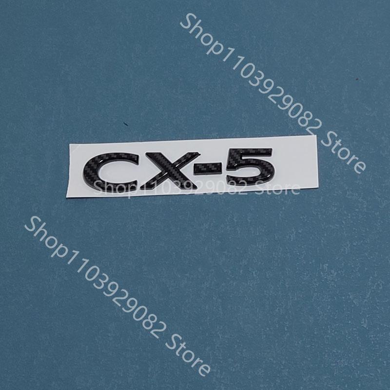For Mazda CX-50 Black Front Logo, Middle Grille Sticker, CX-5 Rear Logo, Luggage Compartment Logo Accessory Sticker Carbon Fiber Xlnpu00