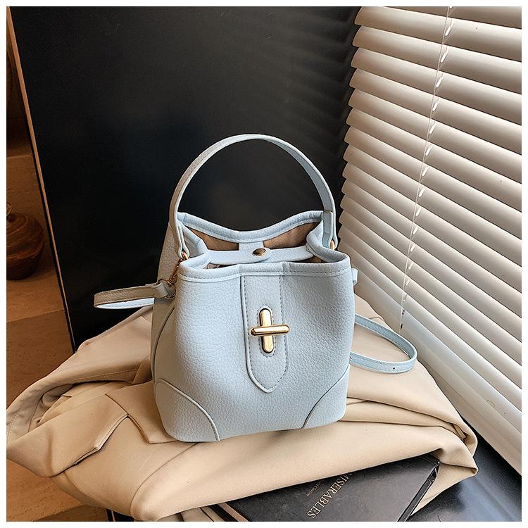 

Простое чувство портативной сумки-ведра женская рабочая сумка через плечо 2025 ранняя весна маленькая свежая модная сумка-мессенджер