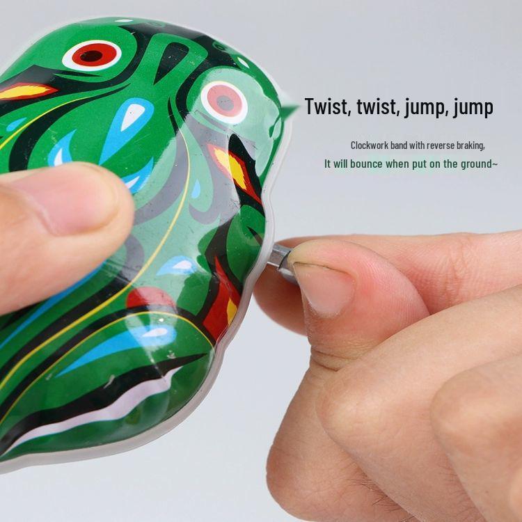 Childhood Nostalgia: Wind-up Tinplate Frog Toy for Children