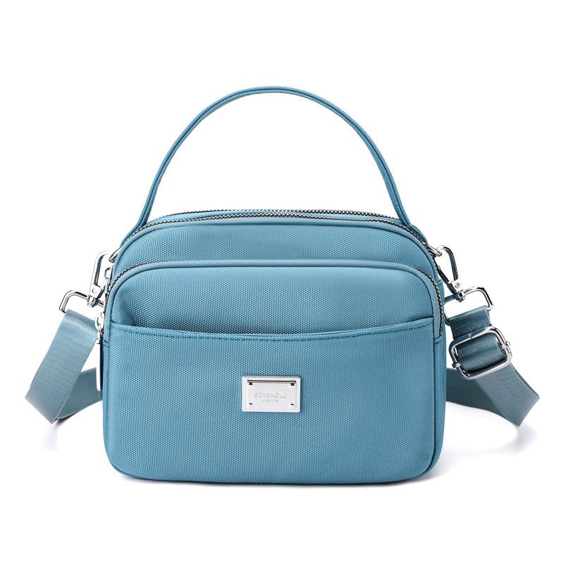 Bolsa feminina de tendência de rua portátil de um ombro crossbody bolsa de mãe feminina da moda