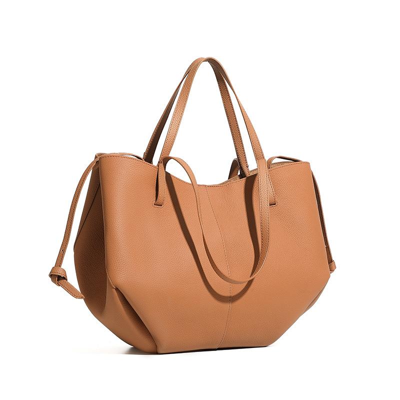Dámská taška Cowhide Big Tote je všestranná a jednoduchá taška na nákupy a nakupování potravin.