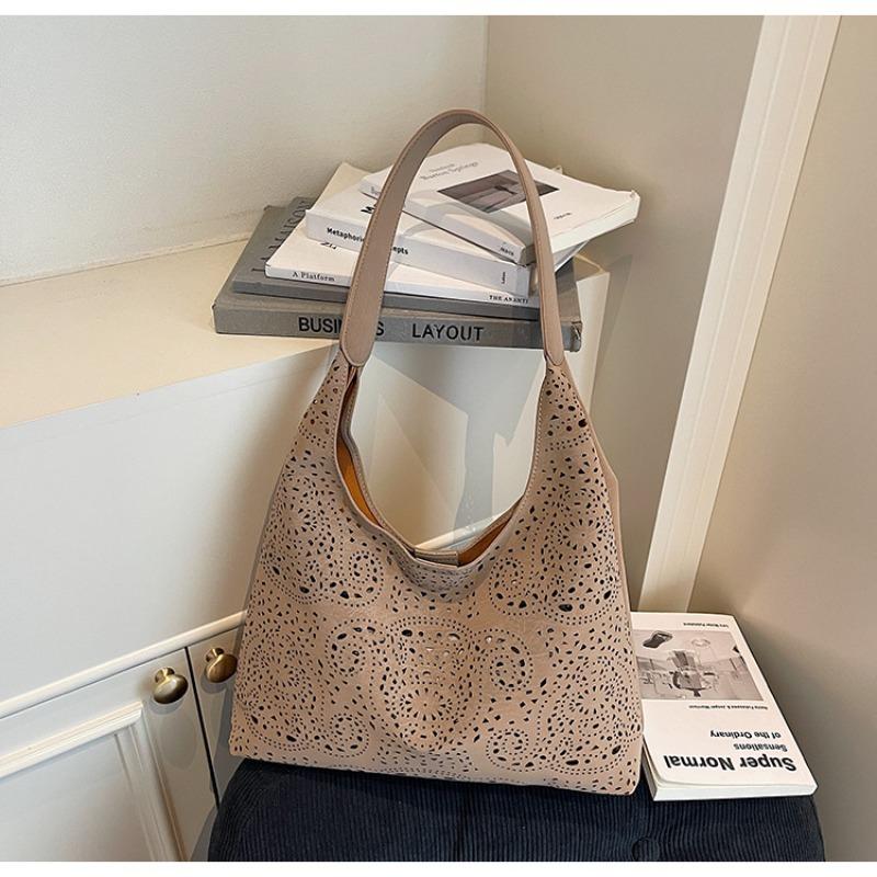 

Large-capacity hollow bag women s autumn and winter new retro shoulder underarm mother bag commuter tote bag коричневый