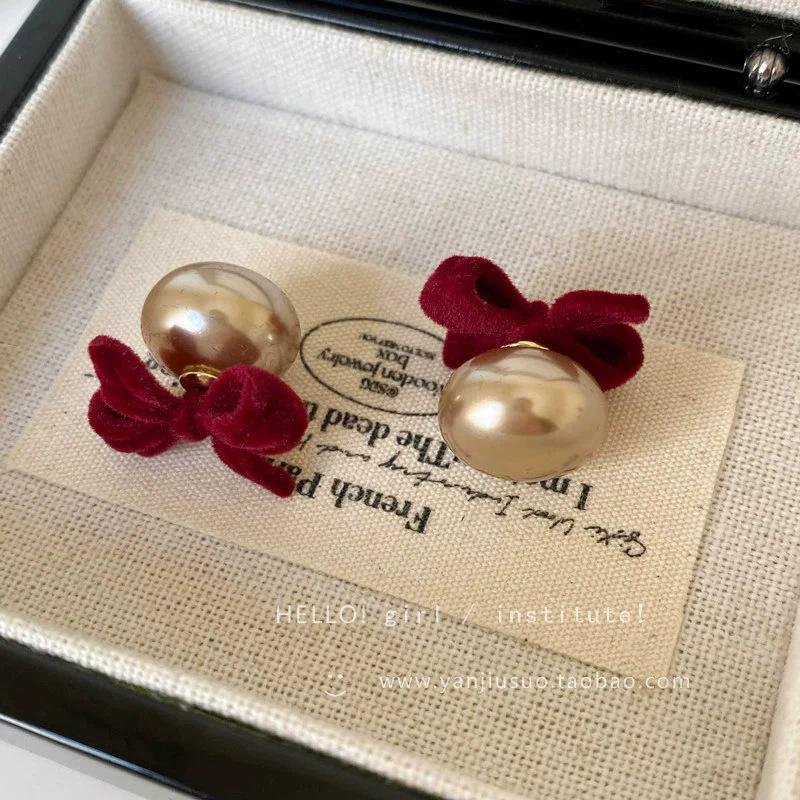 

Retro New Year s burgundy bow pearl earrings niche high-end new women s light luxury stud earrings autumn and winter earrings