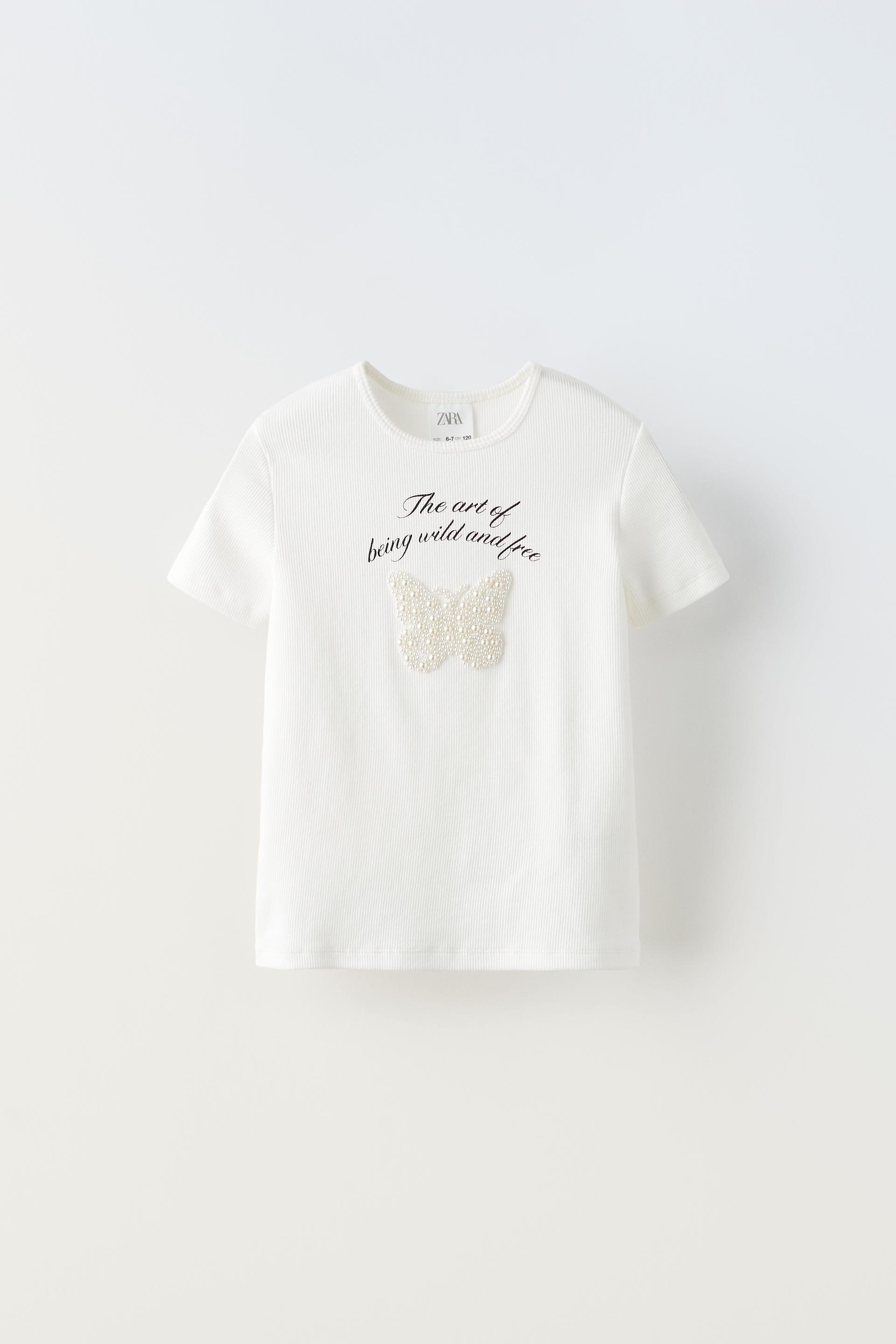 

ФУТБОЛКА В РЕБРИКУ С ИСКУССТВЕННЫМ ЖЕМЧУГОМ