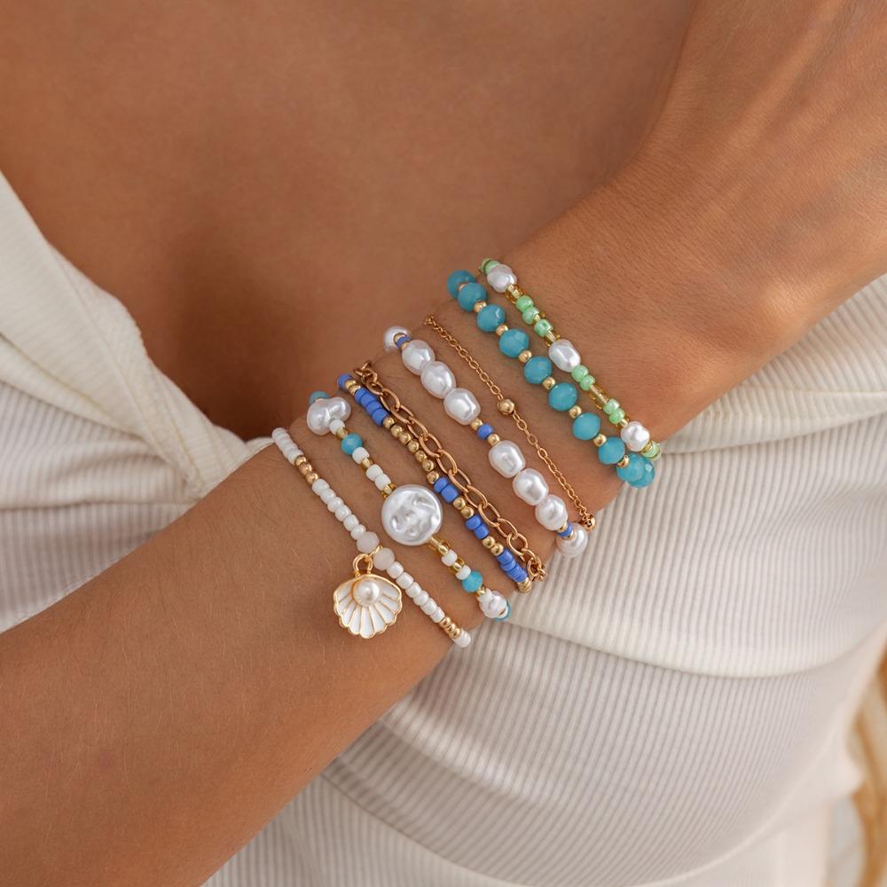 8-teiliges Set Boho Perlen-Stapelarmband-Set für Damen Meeresmuschel Perlen-Anhänger Mehrschichtig Blaue Rocailles Strandurlaub Schmuck