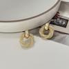 A Pair of Stylish Golden Glass Inlaid Earrings That Are Elegant And Comfortable, Suitable for Various Skin Tones And Perfect for Parties