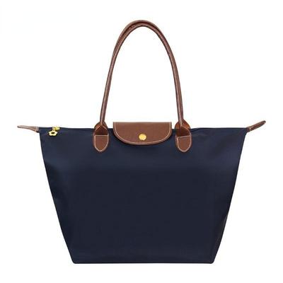 Nuova borsa da spiaggia in nylon Borsa da donna di moda Borsa a tracolla Oxford Borsa da spesa pieghevole per gnocchi impermeabili femminili 2024