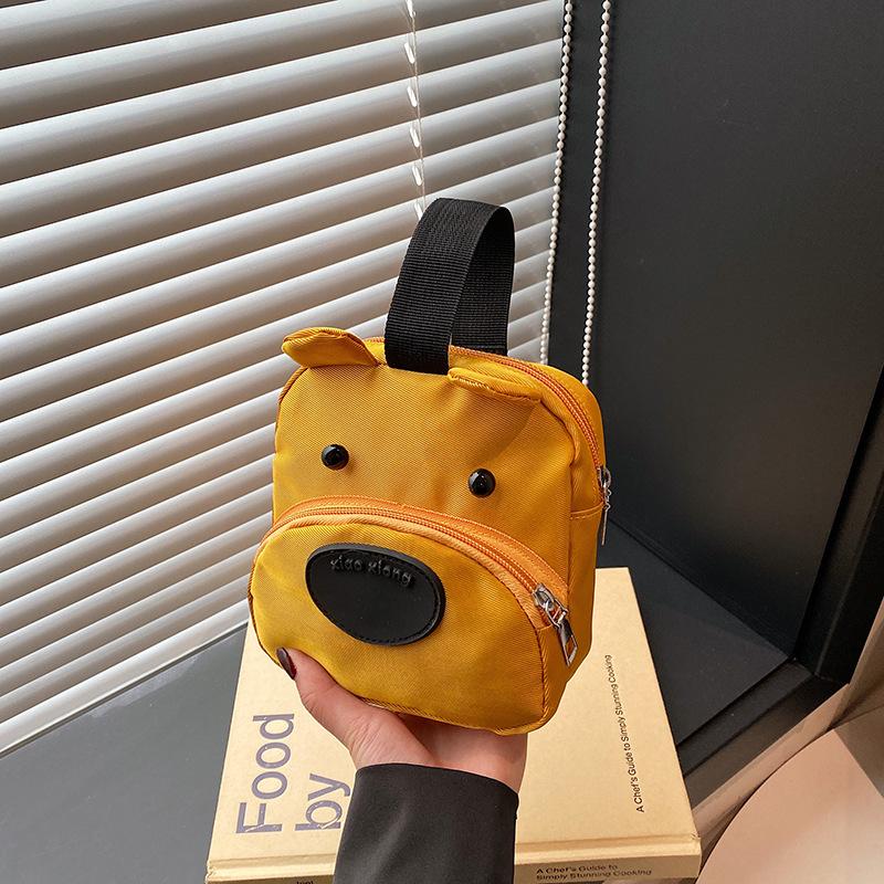 Three-color patch small bag female new dog change handbag cartoon cute student hand mobile phone bag versatile