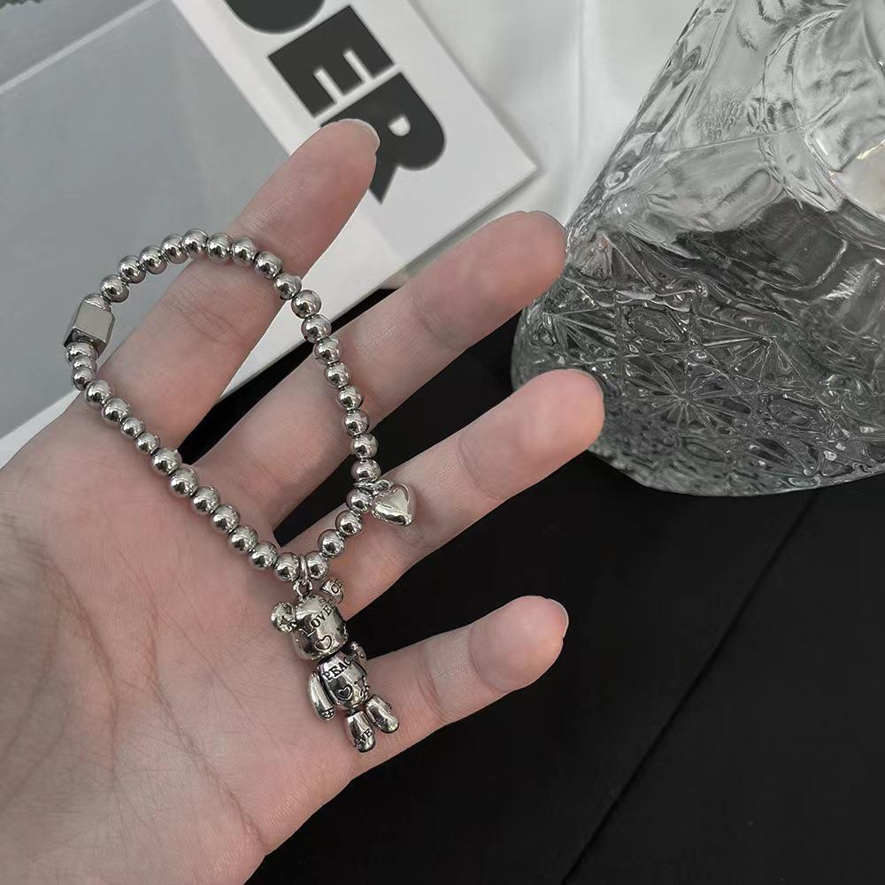 Trendy Women's Love Mechanical Teddy Bear Bracelet - Elastic Bangle with Round Beads, Niche Design In Ins Style.