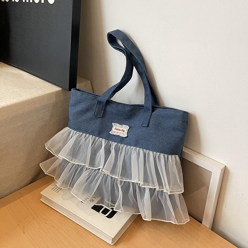 

Fashion versatile tulle lace denim bag new handbag women s high-end shoulder bag commuter bag темно-синього кольору