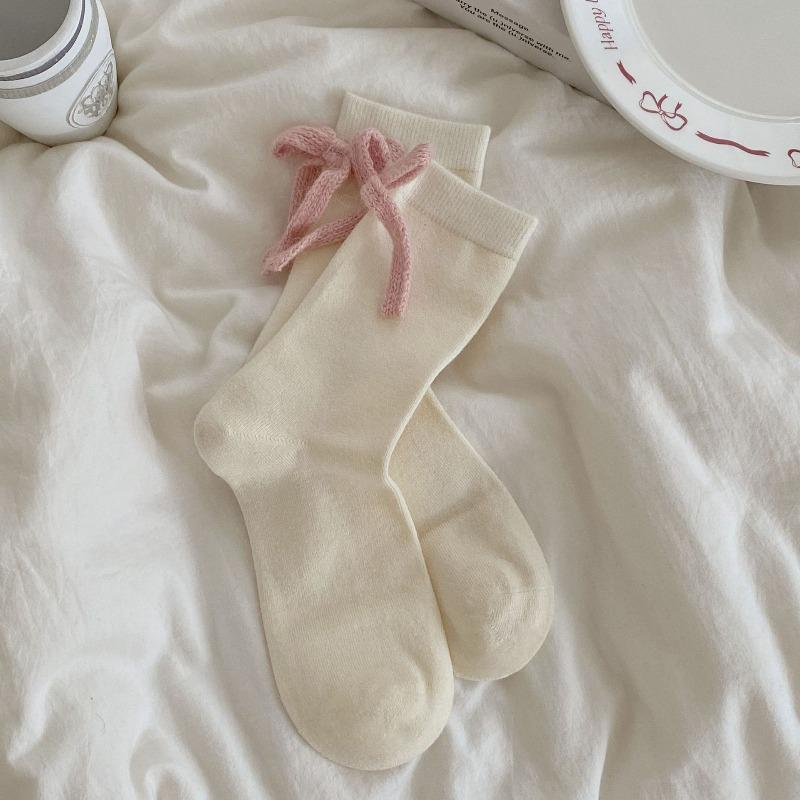

Boneless, Warm, Soft and Fluffy Rabbit Fleece Solid Color Socks for Autumn and Winter. Sweet and Contrasting Color Mid-calf with A Bow At The Back 1 pair