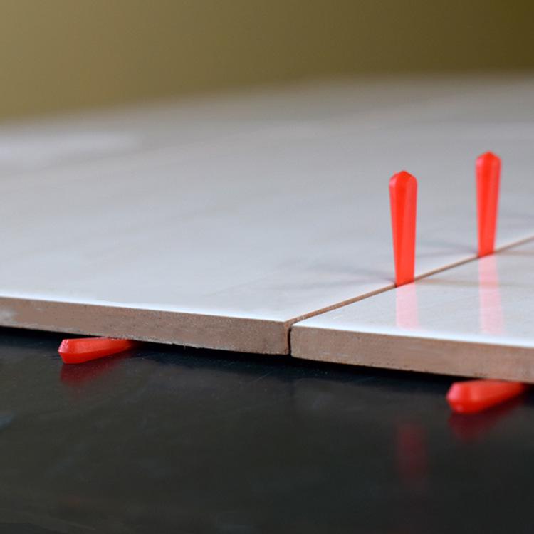 Tile Spacer and Leveler: Small Gasket Wedge for Floor Gap Adjustment