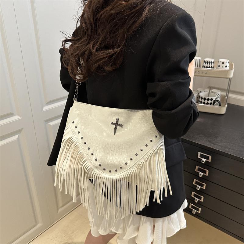 2505 spring and summer season new fashion rivet soft leather trendy casual rivet fringed bag single shoulder oblique span bag women's bag