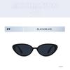 Women's sunglasses, simple small frame cat eye sunglasses.