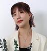 French Retro Clavicle Chain Necklace: 18k Gold-Plated Titanium Steel with Cat's Eye Oval Pendant for Women