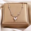 Elegant Titanium Heart Necklace - Light Luxury Women's Stainless Steel Jewelry, European & American Niche Design.