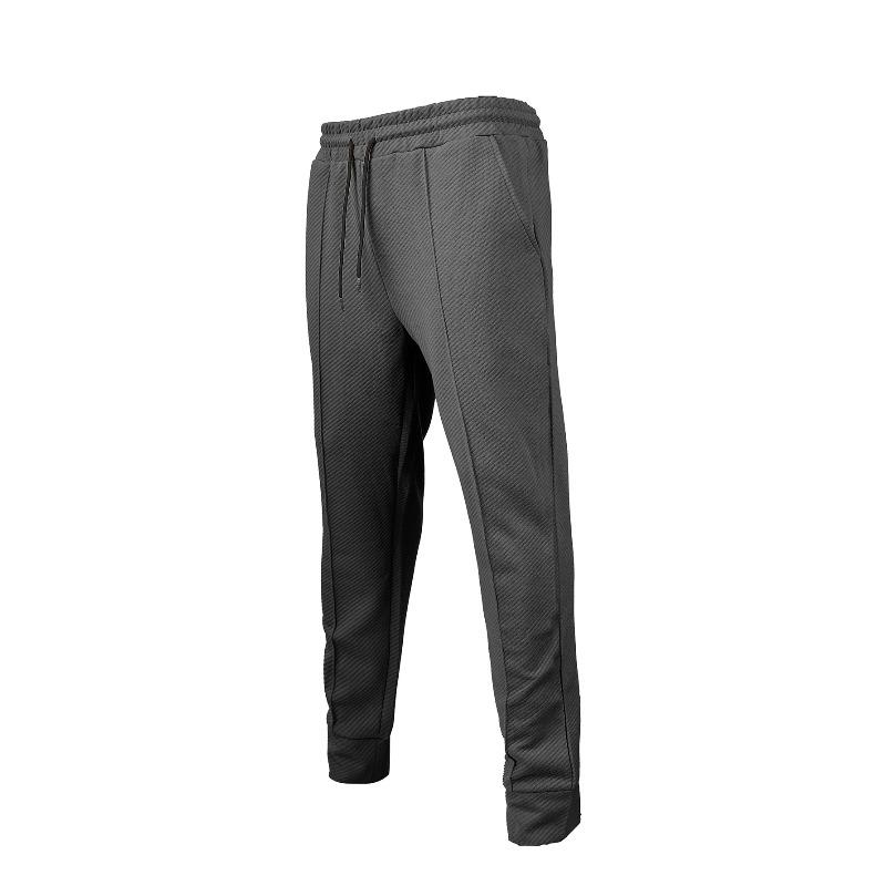 

Весенне-осенние мужские спортивные повседневные однотонные брюки-джоггеры свободного кроя на кулиске со средней посадкой XXXL темно-серого