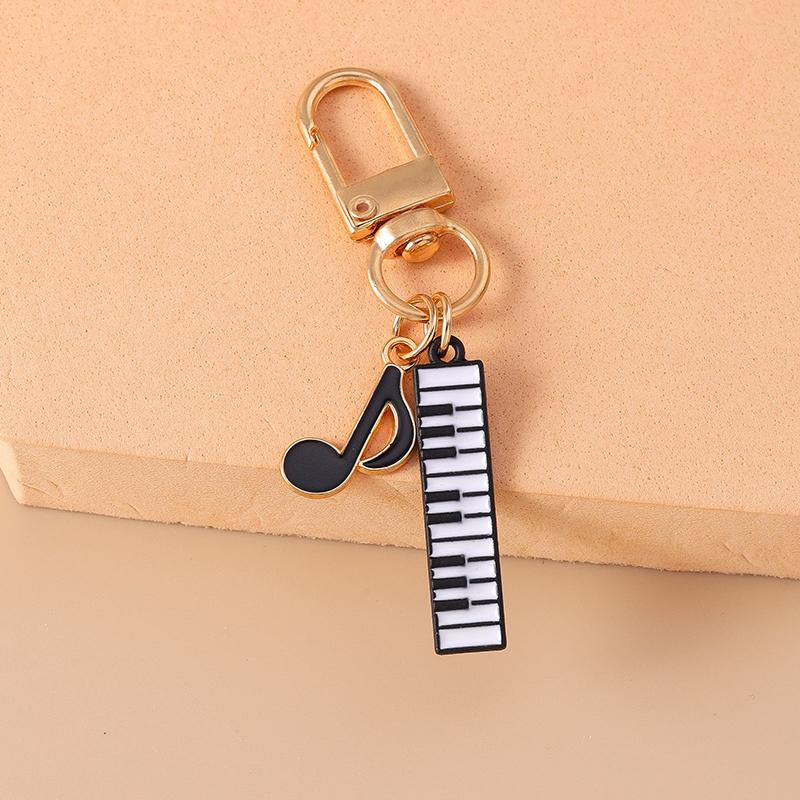 Niedlicher Emaille Mini-Klavier Schlüsselanhänger Simulation Musikinstrumente Schlüsselring Anhänger Damen Mädchen Handtaschen Dekoration DIY Schmuck Geschenk