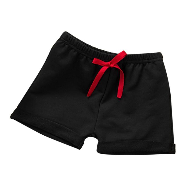 Jungen und Mädchen wilde einfarbige Shorts