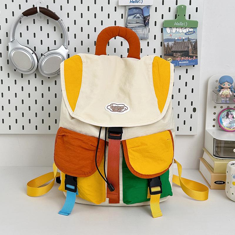 

New fashion color matching backpack Korean version high value color contrast large capacity travel simple travel parent-child small backpack large bag