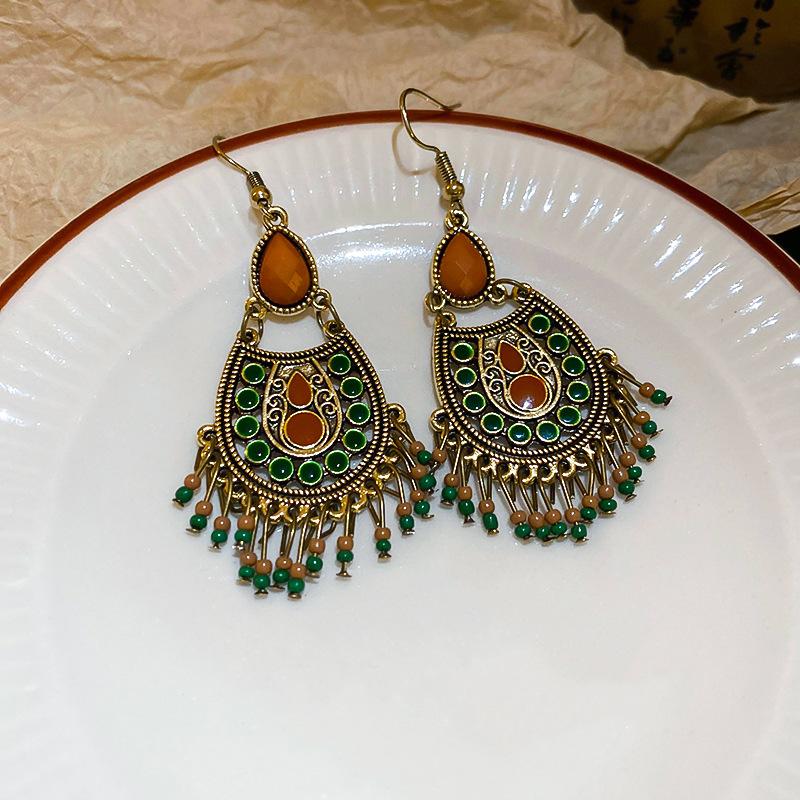 Europäischer und amerikanischer ethnischer Stil, mit Diamanten besetzte Wassertropfen-Quasten-Ohrringe, Steckerohrringe, Damenohrringe, Design-Sinn Nische