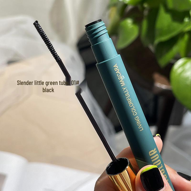 Magic Lash: Waterproof & Smudge-Proof Volumizing Mascara with Curling and Lengthening Small Brush Head.
