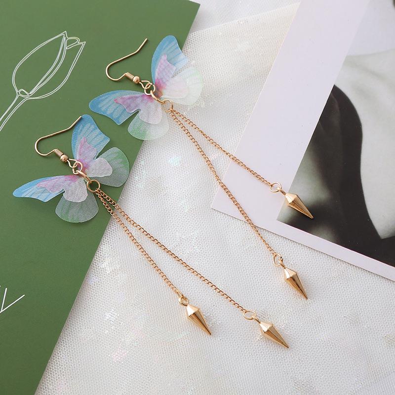 Purple Tassel Butterfly Pearl Earrings: Bold and Elegant Design