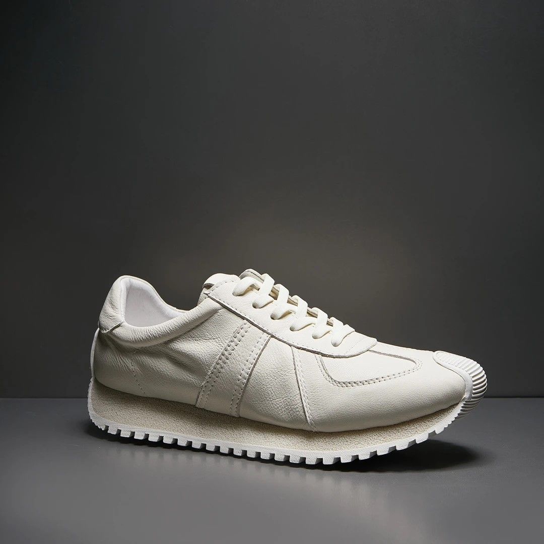 

2025 новая мужская обувь осень-зима тренд мода тренд кожаная обувь удобная повседневная спортивная обувь мужская универсальная обувь Forrest Gump мужская 44 белый