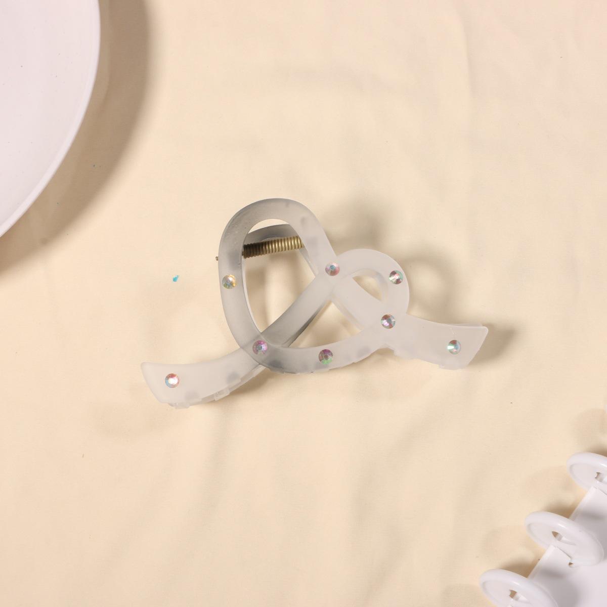 High-End French Bow Claw Clip: Versatile Girlish Shark Clip, Hollowed-Out Hair Accessory