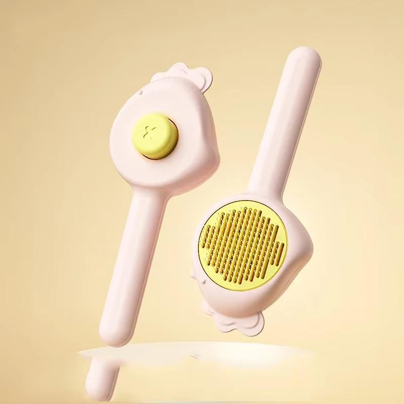 

1 шт. Расческа для домашних животных, для ухода за кошками и собаками, для удаления шерсти, массажная щетка, чистка, принадлежности для домашних животных, для удаления пуха, самоочищающаяся игла розовый