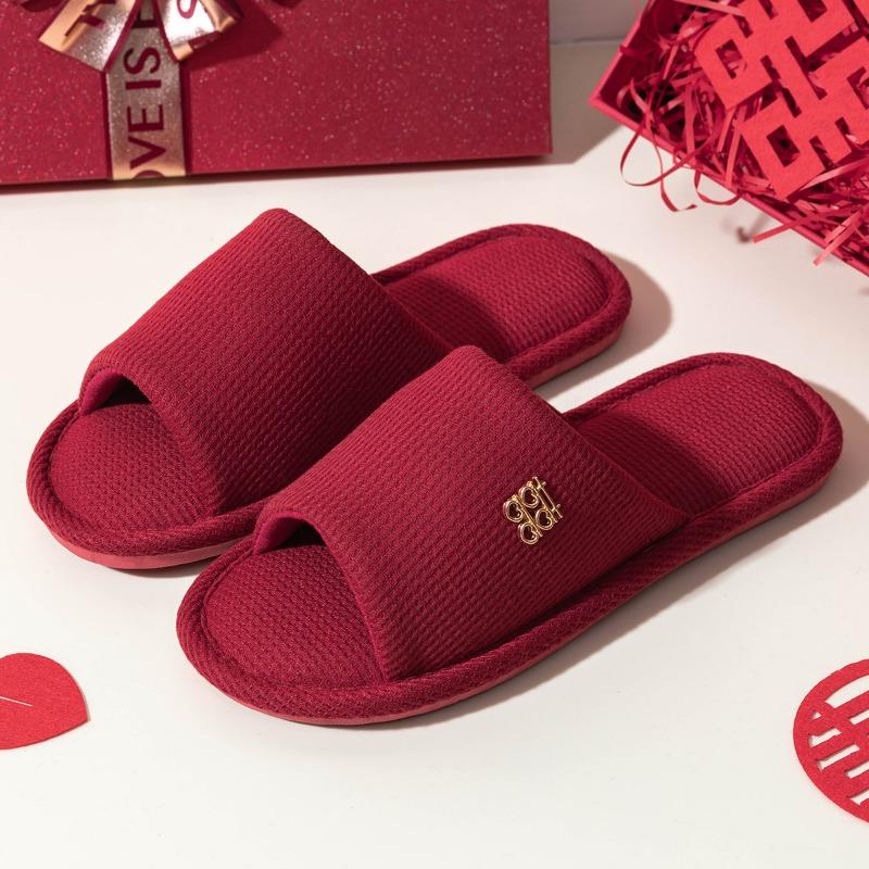 A pair of red wedding slippers autumn and winter light luxury newlyweds festive wedding bride dowry slippers groom